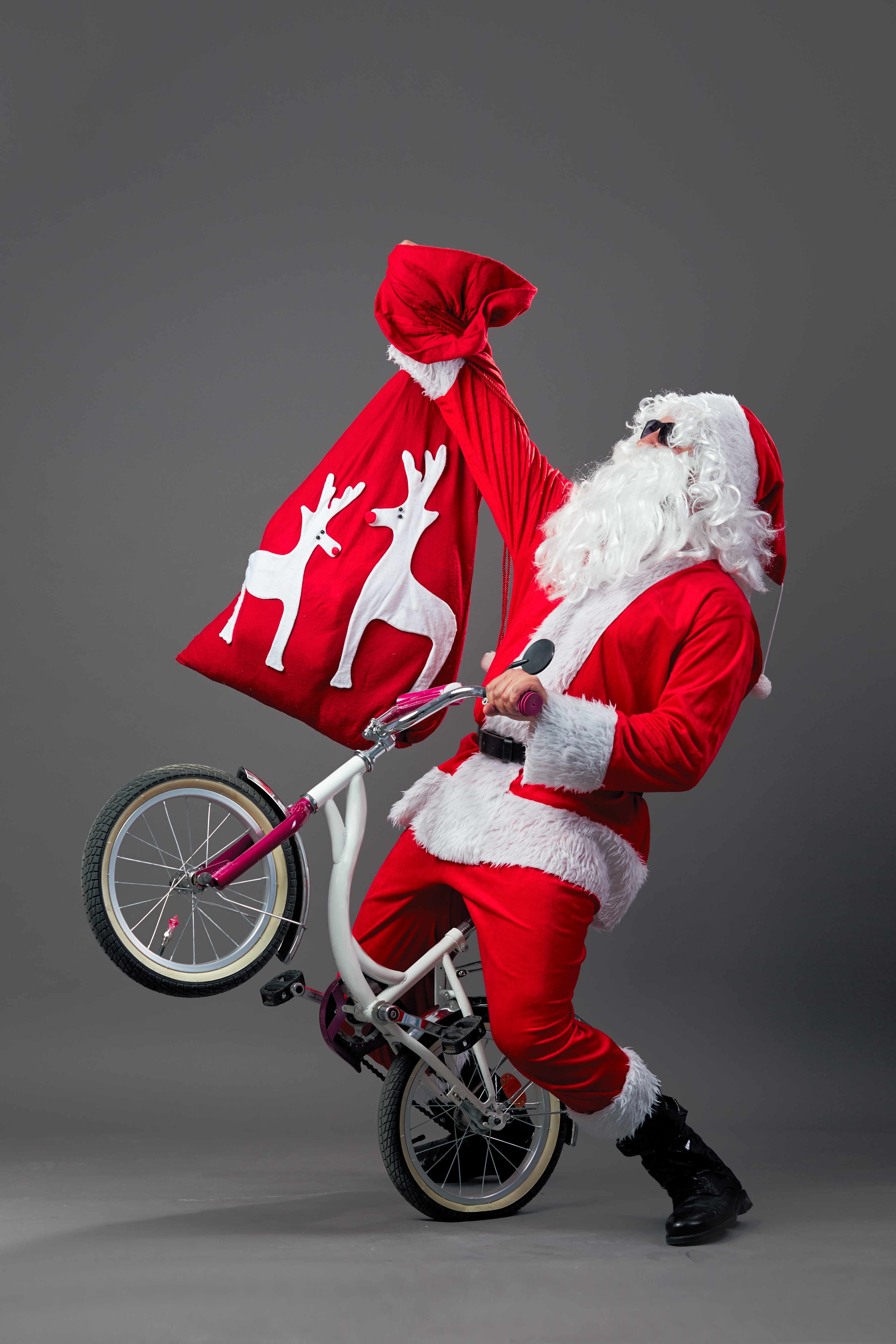 Father Christmas on a bike